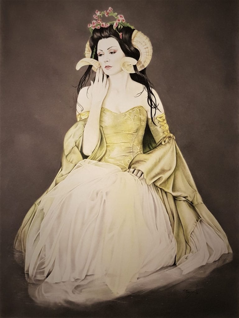 Portrait of lady in dress with horns on head