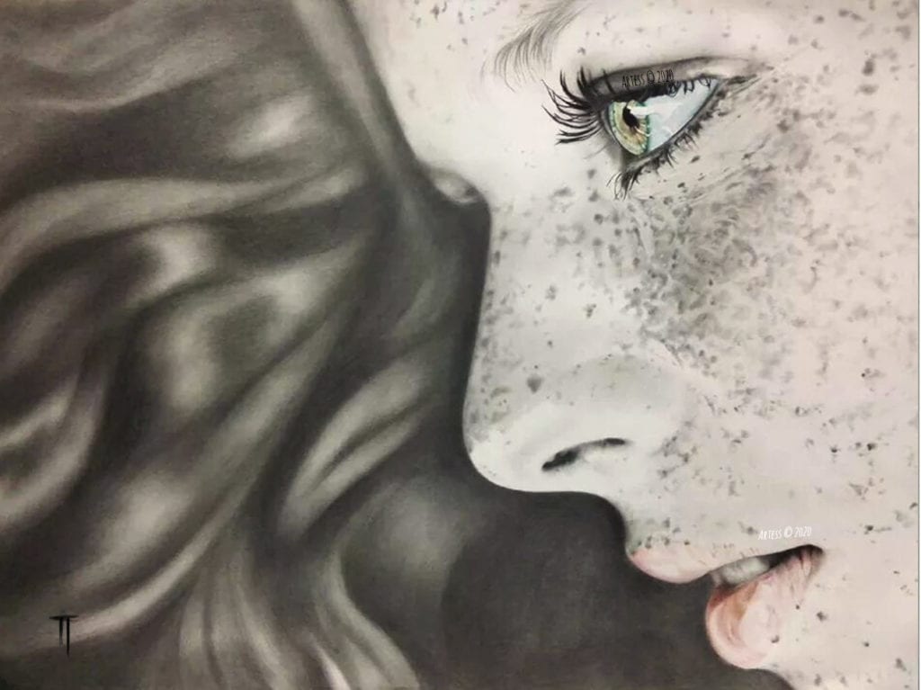Side portrait of woman with freckles