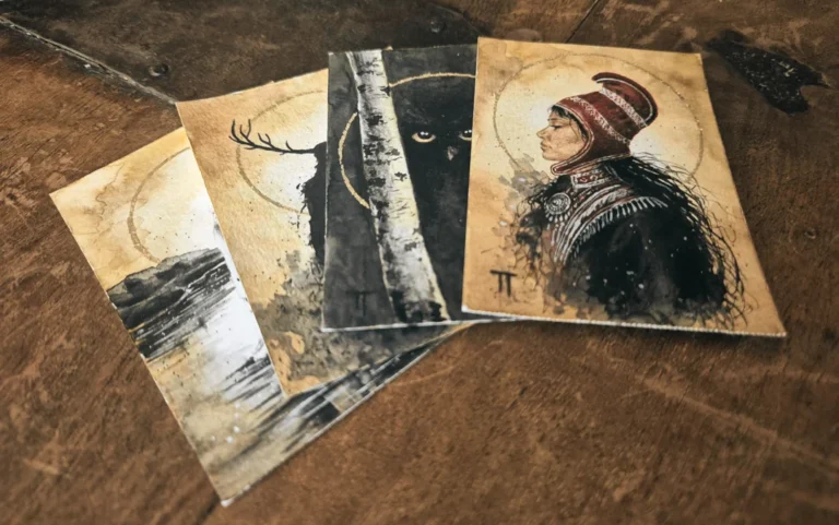 Fire ACEO kort lagt ut på et bord med samisk motiv